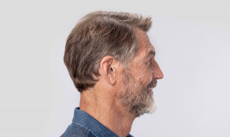 man with Eargo inserted into ear