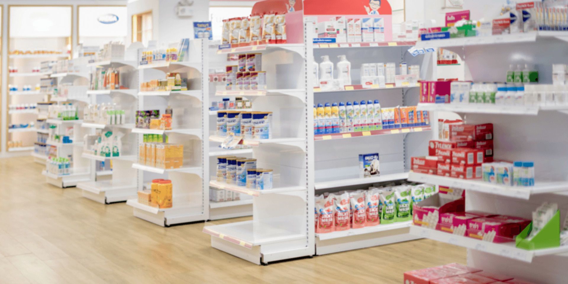 Aisles of over-the-counter products inside a pharmacy
